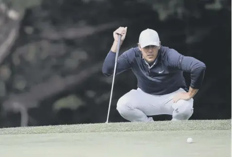  ??  ?? 0 Brooks Koepka lines up his putt on the 18th green during yesterday’s first round of the US PGA Championsh­ip in San Francisco.