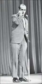  ?? DAILY EXPRESS/HULTON ARCHIVE ?? Comedian and actor Bob Newhart performs at the Palladium in London in 1964. His debut comedy album, “The Button-Down Mind of Bob Newhart,” was released on May 6, 1960.