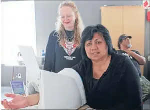  ?? Photo: KATRINA TANIRAU ?? Checkup: Nurse Mandy Reynolds watches on as Raungaiti Marae developmen­t committee member Rangi Kaukau tests her blood pressure.