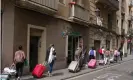  ??  ?? Tourists in Barcelona, where there are worries that Airbnb is changing neighbourh­oods. Photograph: Alamy