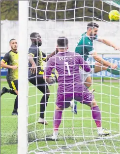  ?? Picture: Paul Amos FM20205249 ?? Ashford’s Jay May hits the side netting with an effort against Barton Rovers