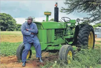  ??  ?? Insulted by authoritie­s: Farmer Philip Nkoana says land invaders have stolen his livestock and crops, but that the authoritie­s have failed to act