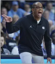  ?? (AP/Craig Mitchelldy­er) ?? Coach Hubert Davis and the North Carolina Tar Heels fell out of The Associated Press Top 25 men’s basketball poll Monday. They’re the sixth team to go from preseason No. 1 to unranked since at least the 1961-62 season.