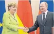  ?? FOTO: DPA ?? Merkel und Putin in Sotschi.