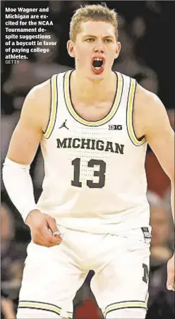  ??  ?? Moe Wagner and Michigan are excited for the NCAA Tournament despite suggestion­s of a boycott in favor of paying college athletes.