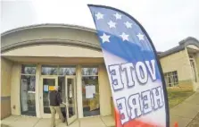  ??  ?? A voter enters the Hamilton County Election Commission for early voting on Wednesday.