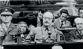  ?? GETTY IMAGES ?? A Japanese historian has found documents that cast doubt on the report that Hideki Tojo, centre, the former Japanese general, premier and war minister who was executed for war crimes, was cremated and then his ashes enshrined in a Buddhist temple.