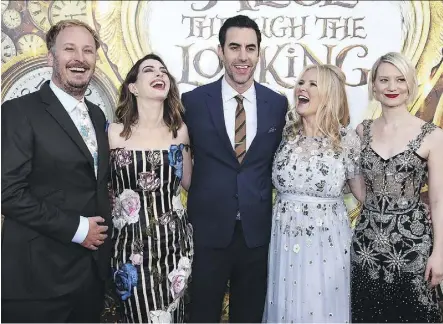  ?? JORDAN STRAUSS/INVISION/THE ASSOCIATED PRESS ?? From left, James Bobin, Anne Hathaway, Sacha Baron Cohen, Suzanne Todd and Mia Wasikowska arrive at the premiere of Alice Through the Looking Glass in LA.