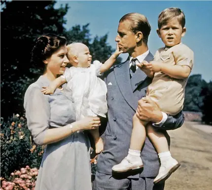  ??  ?? Prince Philip in 1951 while serving as Lieutenant Commander in the Royal Navy (also far right)