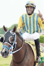 ??  ?? Jockey Jevanne Erwin celebratin­g his win aboard CHACE THE GREAT in the Thoroughbr­ed Racing Hall Of Fame Stakes over 1200 metres last Saturday.