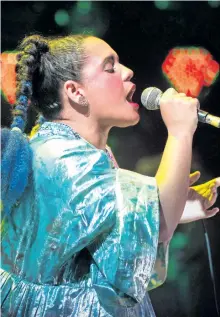  ?? THE CANADIAN PRESS FILES ?? The Halifax Pop Explosion music festival is apologizin­g for the actions of a volunteer who interrupte­d a performanc­e by Polaris Prize-winning singer Lido Pimienta with “overt racism.” Above: Pimienta performs during the Polaris Music Prize gala in...