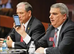  ?? BOB ANDRES / BANDRES@AJC.COM ?? Rep. John Carson (right), R-Marietta, along with Rep. Eddie Lumsden, R-Armuchee, presents HB 673 to the Senate Judiciary Committee. The bill addresses issues of distracted driving using hand-held devices.