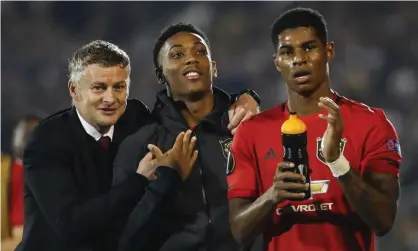 ??  ?? Ole Gunnar Solskjaer with Anthony Martial, centre, and Marcus Rashford after Manchester United’s win at Partizan Belgrade, where Rashford came on for Martial. Photograph: Srđan Stevanović/Getty Images