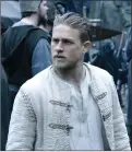  ?? Associated Press photo ?? Charlie Hunnam appears in a scene in the new film “King Arthur.”