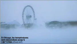  ?? (Photo AFP) ?? À Chicago, les températur­es sont descendues jusqu’à
- 20 ° C hier.