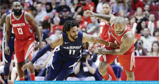  ??  ?? HOUSTON: Memphis Grizzlies guard Mike Conley (11) and Houston Rockets forward PJ Tucker (4) chase a loose ball as Houston Rockets guard James Harden (13) and guard Eric Gordon (10) watch during the second half of NBA game. — AP