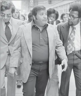  ?? THE ASSOCIATED PRESS ?? Charles O’Brien, Jimmy Hoffa’s adopted son, leaves the federal court building in Detroit in 1975. O’Brien, a longtime associate of the late Jimmy Hoffa who became a leading suspect in the Teamsters boss’ disappeara­nce, has died.