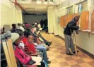  ?? /Financial Mail ?? Strike looms: People wait their turn at Edendale Hospital’s dispensary in Pietermari­tzburg in this file picture.