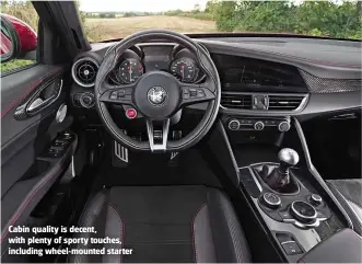  ??  ?? Cabin quality is decent, with plenty of sporty touches, including wheel-mounted starter