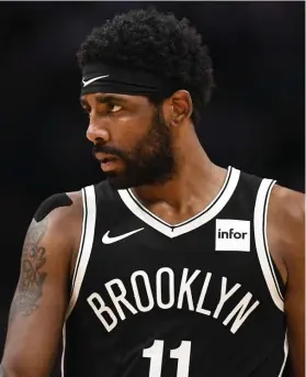  ?? DENVER POST FILE ?? HOPE HE GETS THE JAB: NBA commission­er Adam Silver said Monday that he hopes Kyrie Irving gets vaccinated soon and rejoins the Brooklyn Nets. The Nets open the league’s 75th season tonight in Milwaukee against the Bucks, who begin their title defense.