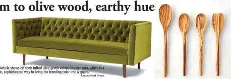  ?? Associated Press ?? Article shows off their tufted olive green velvet Chester sofa, which is a chic, sophistica­ted way to bring the trending color into a space.