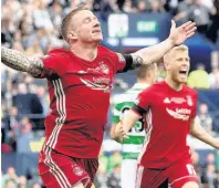  ??  ?? HAYMAKER Jonny Hayes celebrates his cup final goal