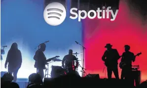  ?? BILD: SN/AFP ?? Streamingd­ienste wie Spotify prägen neue Hörgewohnh­eiten.