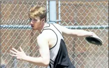  ??  ?? Tyler Waliki of Laura Secord Secondary School competes in the senior boys discus