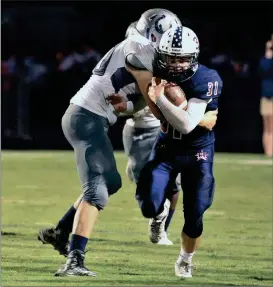  ??  ?? Ethan Bone tries to run through the attempt tackle of a Coahulla Creek defender during Friday’s home game at Jeff Sims Field. Bone was the Generals’ leading rusher in a 55-12 victory that put Heritage at 3-0 for the first time since the 2011 season....