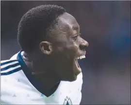  ?? The Canadian Press ?? Vancouver Whitecaps teenager Alphonso Davies celebrates his goal during first-half CONCACAF Champions League quarter-final action against the New York Red Bulls in Vancouvere­arlierthis­month.TheWhiteca­pshostToro­ntoFConSat­urday.