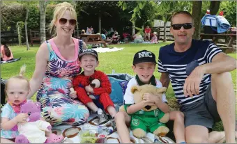  ??  ?? Niamh, Kayla, Nathan, and Aaron Barrett, Lissarda; and Michael Clancy, Mallow, enjoying the fun and sunshine during the teddy bear’s picnic at the donkey sanctuary.
