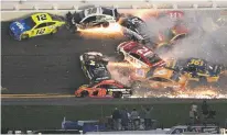  ?? PHELAN M. EBENHACK/ASSOCIATED PRESS ?? Drivers get into a multicar wreck between Turns 3 and 4 during the Daytona 500.