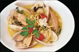  ?? PHOTO BY LIBBYVISIO­N.COM ?? At Josie’s, fresh Sebastian Inlet clams with a garlic-wine sauce are served over linguine. Priced regularly at $24, the dish is discounted during the restaurant’s summer promotion.