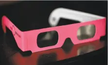  ??  ?? Certified solar eclipse-viewing glasses are available in the gift shop at the Explorator­ium in San Francisco.