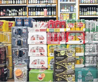  ?? Pictures: PA/Getty. ?? Many people feel the issue of problem drinking is down to cut-price alcohol being offered by many shops, which minimum pricing is trying to solve.