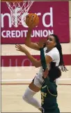  ?? TONY AVELAR — THE ASSOCIATED PRESS ?? Stanford guard Haley Jones drives to the basket against Cal Poly guard Chantel Govan during the first half on Wednesday.