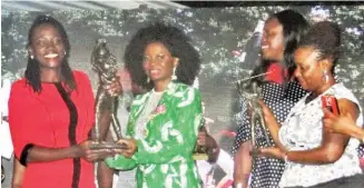  ?? PHOTO: ?? From left: 2019 Nigerian Ladies Open winner, Irene Nakalembe receiving her trophy from the outgone president of the Ladies Golf Associatio­n of Nigeria, Ekanem Ekwueme. Olusola ‘Jide