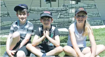  ??  ?? There was plenty to see and do for all ages at the Drouin Men’s Shed open day. Pictured from left Clint Scott and siblings Jack and Dakota Falls. Jack and Dakota attend Drouin Primary School.