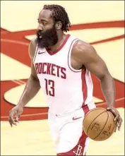  ?? JAMES HARDEN Carmen Mandato Associated Press ?? arrived late to training camp and asked Houston for a trade. A rebuild could be coming.