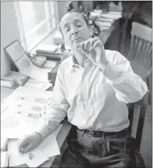  ?? Constantin Joffe Conde Nast via Getty Images ?? ‘ L O L I TA’ novelist and avid lepidopter­ist Vladimir Nabokov inspecting a butterfly. He denied being influenced by Horner case.