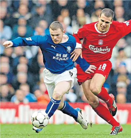  ??  ?? Memory man: Wayne Rooney, playing for Everton at Anfield in 2004, holds off Bruno Cheyrou; current Everton manager Sam Allardyce (inset, left)