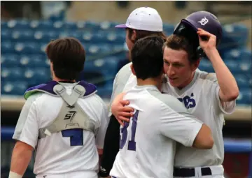  ?? Jeremy Stewart / RN-T ?? Darlington’s Austin Cloud (right) celebrates with teammate Lawson Goodwin after Cloud scored the winning run on a bases-loaded walk in the Tigers’ 2-1 victory over North Cobb Christian on Saturday at State Mutual Stadium.