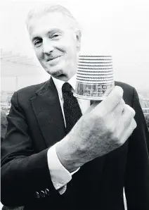  ?? PIERRE GUILLAUD/GETTY IMAGES ?? French aristocrat and fashion designer Hubert de Givenchy poses with the Golden Thimble award of French fashion in Paris in 1982. The designer died March 10 at the age of 91.