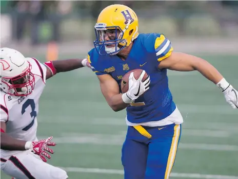  ?? KAYLE NEIS ?? Hilltops receiver David Solie turns upfield with the ball during Saturday’s home opener. Solie has seven catches for 106 yards in two games.