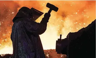  ?? ?? Feeling the heat: A worker in Blast Furnace No 4 at Tata Steel, Port Talbot