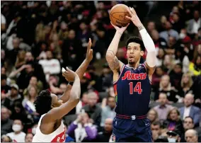  ?? FRANK GUNN/THE CANADIAN PRESS VIA AP, FILE ?? FILE - Philadelph­ia 76ers forward Danny Green (14) shoots over Toronto Raptors forward OG Anunoby (3) during the second half of Game 6of an NBA basketball first-round playoff series in Toronto, on April 28, 2022.