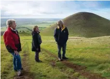  ??  ?? Derrinallu­m locals (from left) Lesley Brown, Val Lang and Chris Lang on Mt Elephant, the volcano they are helping to restore.