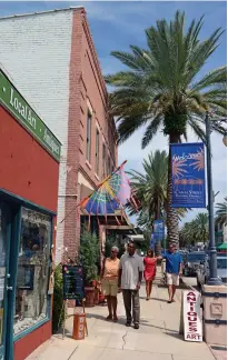  ??  ?? ABOVE: Shopping on Canal Street in New Smyrna Beach. BELOW: Outdoor mural in Historic Downtown Melbourne. OPPOSITE TOP: Poolside relaxation. OPPOSITE BOTTOM: Enjoy wellness spas throughout the region.