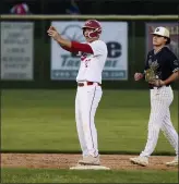  ?? OWEN MCCUE - MEDIANEWS GROUP ?? At left, Owen J. Roberts’ Tommy Lewman (10) raises the PAC championsh­ip plaque on Thursday at Boyertown. Owen J. Roberts’ Zach Santise celebrates after an RBI double against Spring-Ford during Thursday’s PAC championsh­ip game.