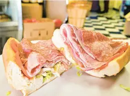  ?? ?? A classic Italian hoagie with Genoa salami, deluxe ham, capicola, soppressat­a and picante provolone is seen Tuesday at David’s Italian Market in Emmaus.